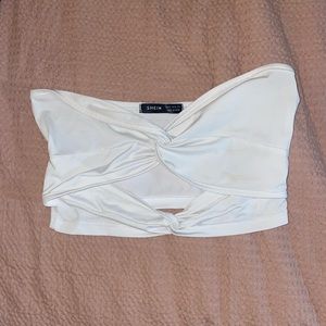 Twist, cut-out tube top